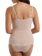 a woman wearing a nude tummy control shaping camisole shapewear