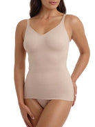 a woman wearing a nude tummy control shaping camisole shapewear