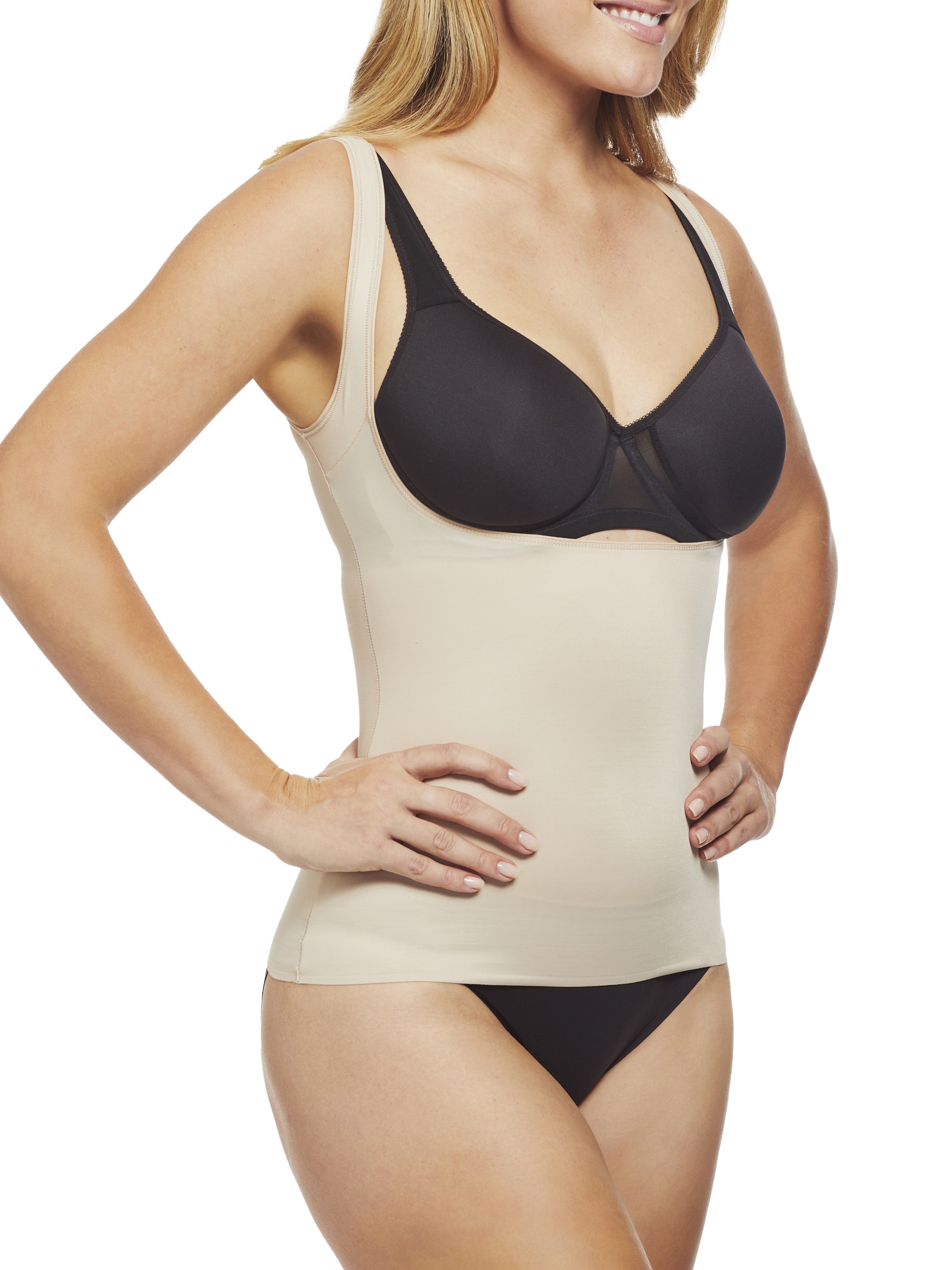 a woman wearing a nude open bust shaping camisole shapewear