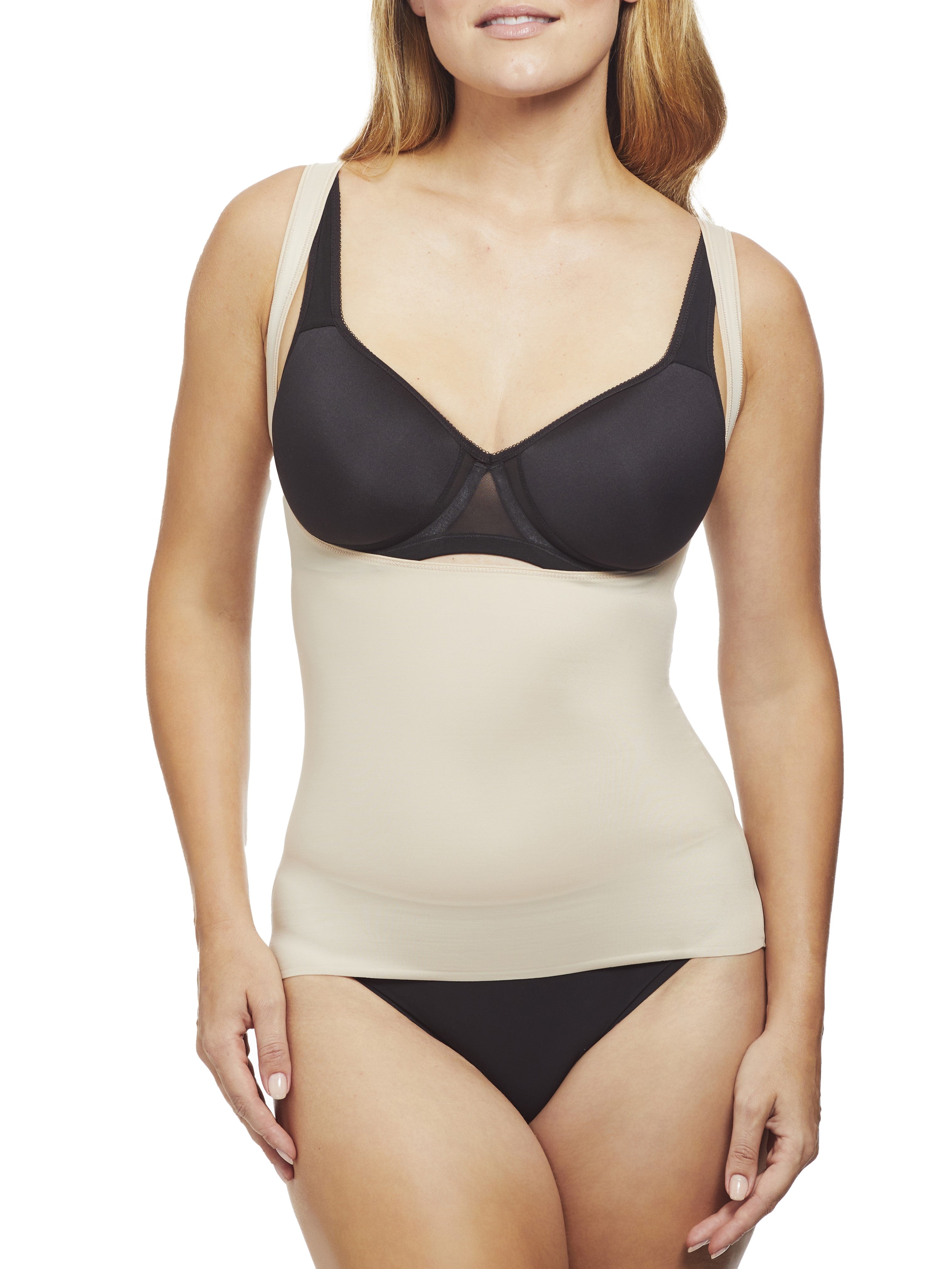 a woman wearing a nude open bust shaping camisole shapewear