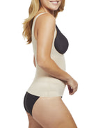 a woman wearing a nude open bust shaping camisole shapewear