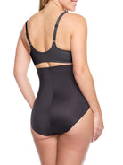 a woman wearing black high waisted tummy control underwear shapewear