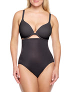 a woman wearing black high waisted tummy control underwear shapewear