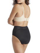 a woman wearing black tummy control underwear shapewear