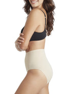 a woman wearing nude tummy control underwear shapewear