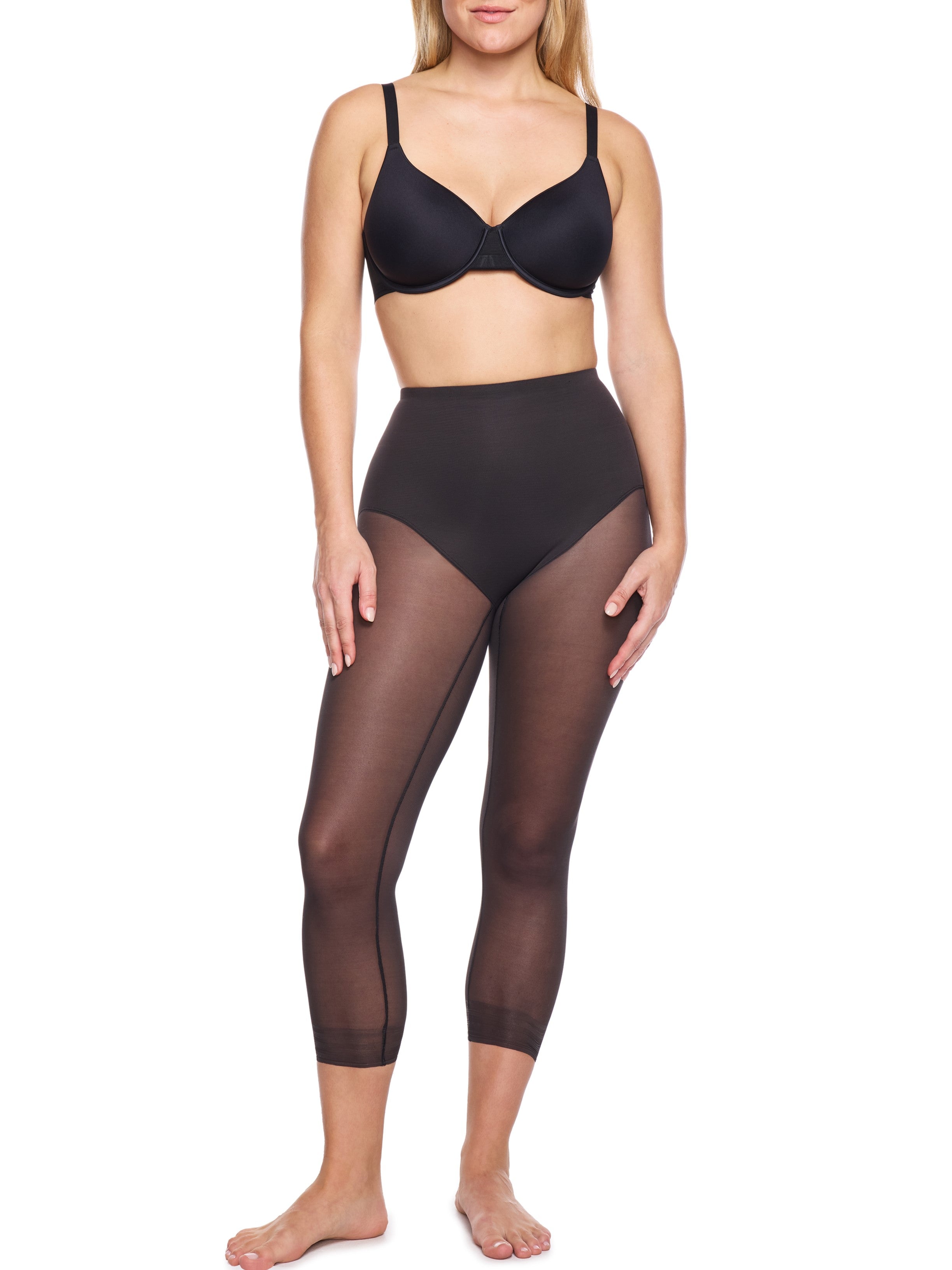a woman wearing black butt lifting tummy control leggings shapewear