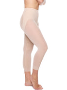 a woman wearing nude butt lifting tummy control leggings shapewear