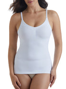 a woman wearing a white tummy control shaping camisole shapewear