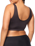 a woman wearing a black bralette