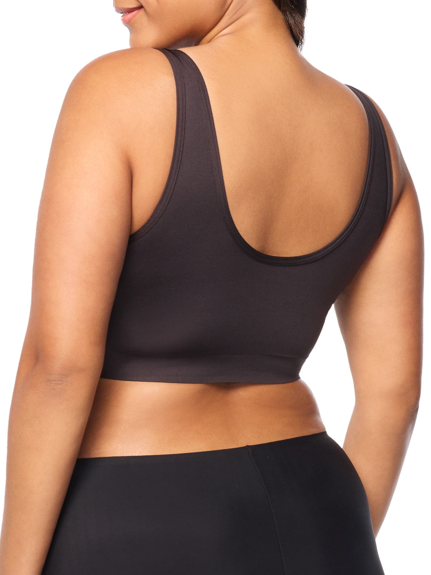 a woman wearing a black bralette