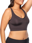 a woman wearing a black wireless bra