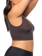 a woman wearing a black lounge bra