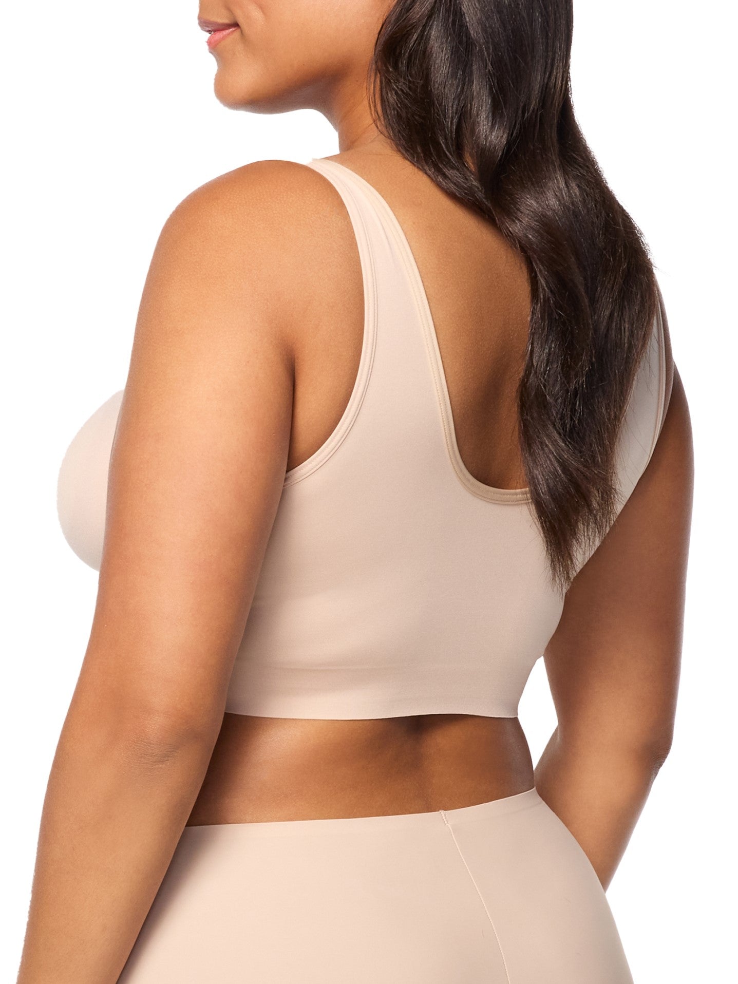 a woman wearing a nude lounge bra