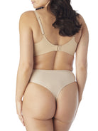 a woman wearing nude tummy control thong underwear
