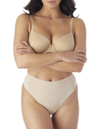 a woman wearing nude tummy control thong underwear