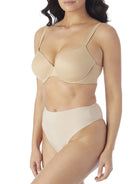 a woman wearing nude tummy control thong underwear