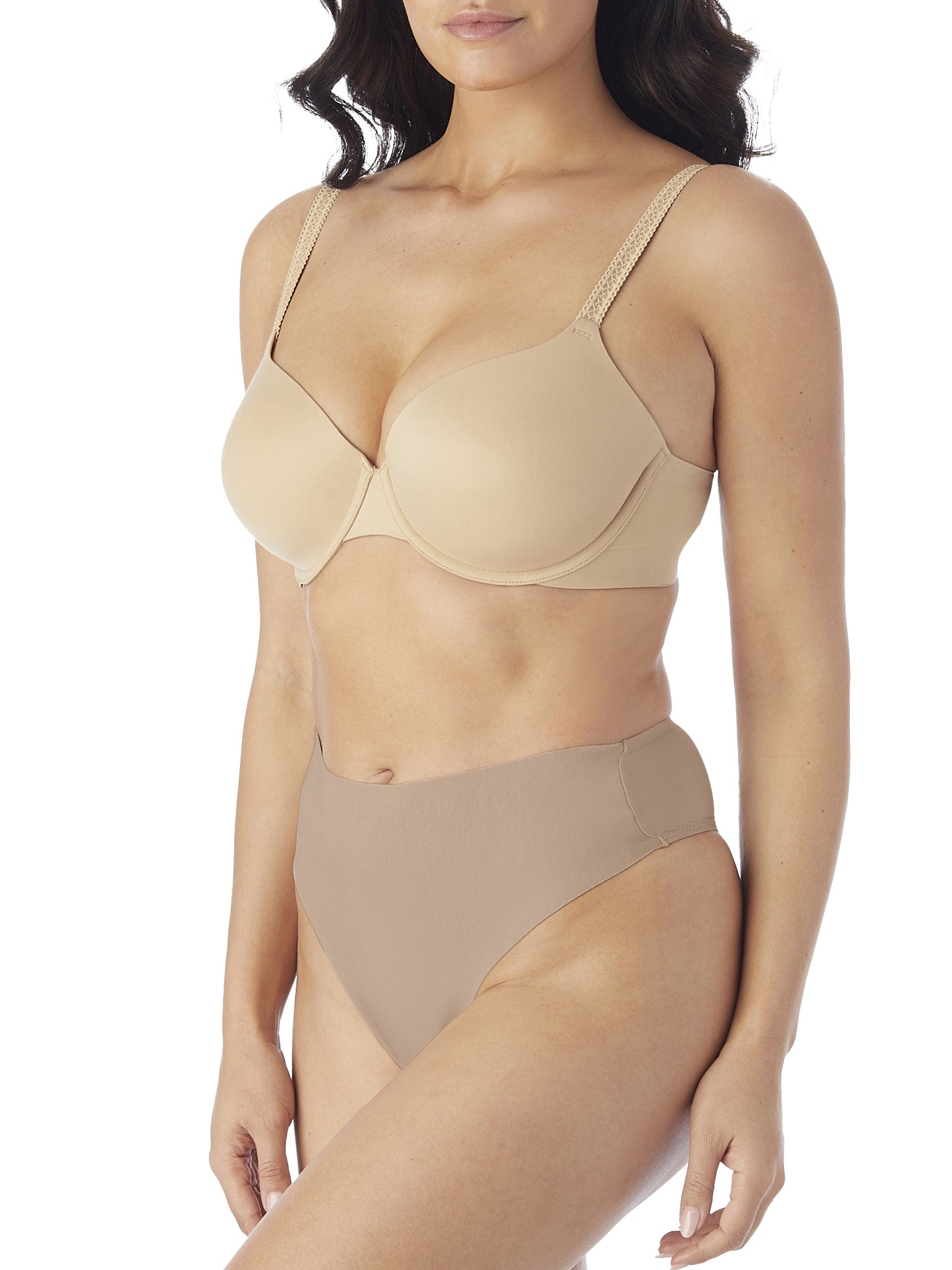 a woman wearing tan tummy control thong underwear