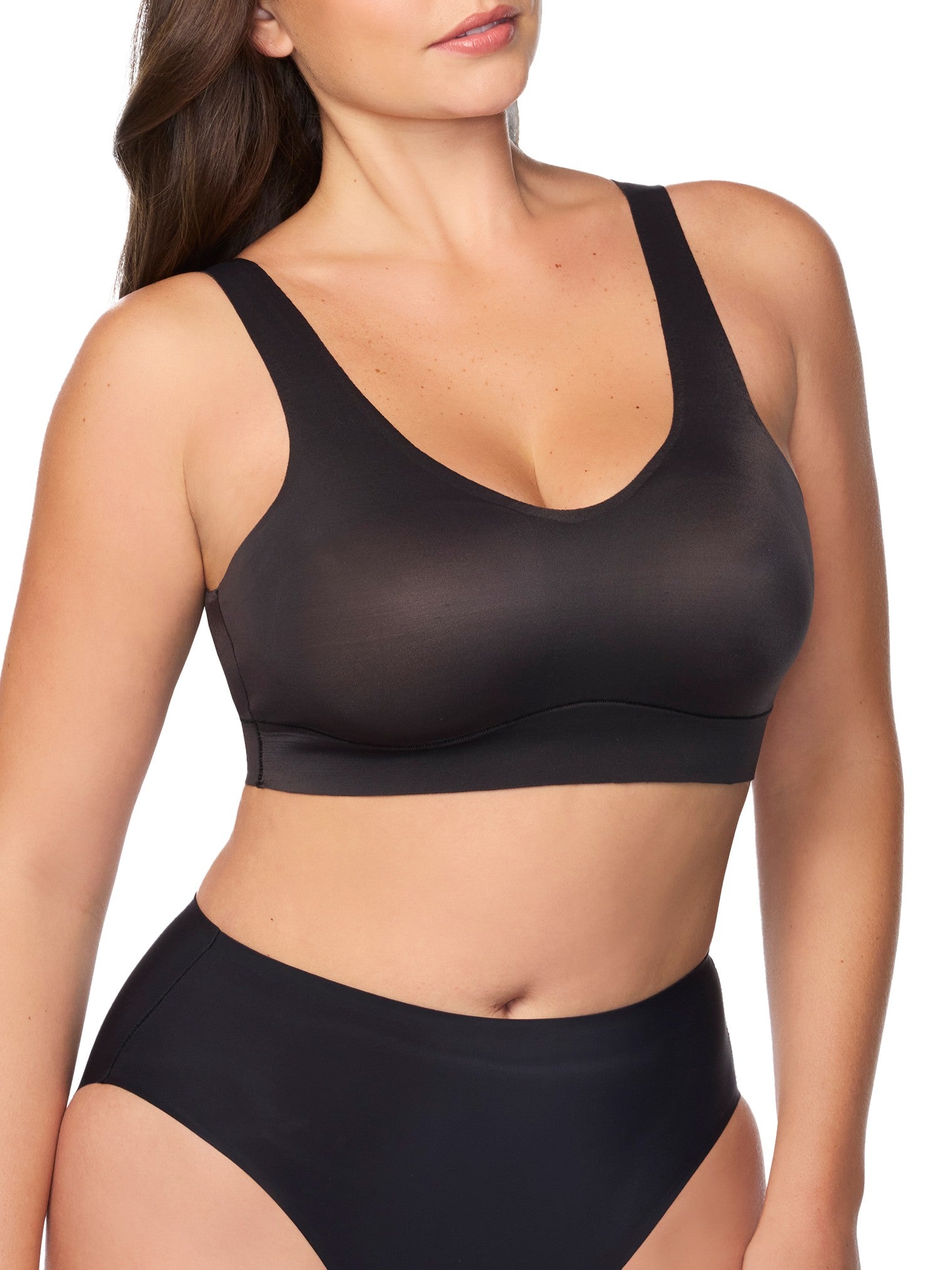 a woman wearing a black bralette wireless bra