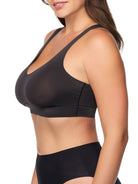 a woman wearing a black bralette wireless bra