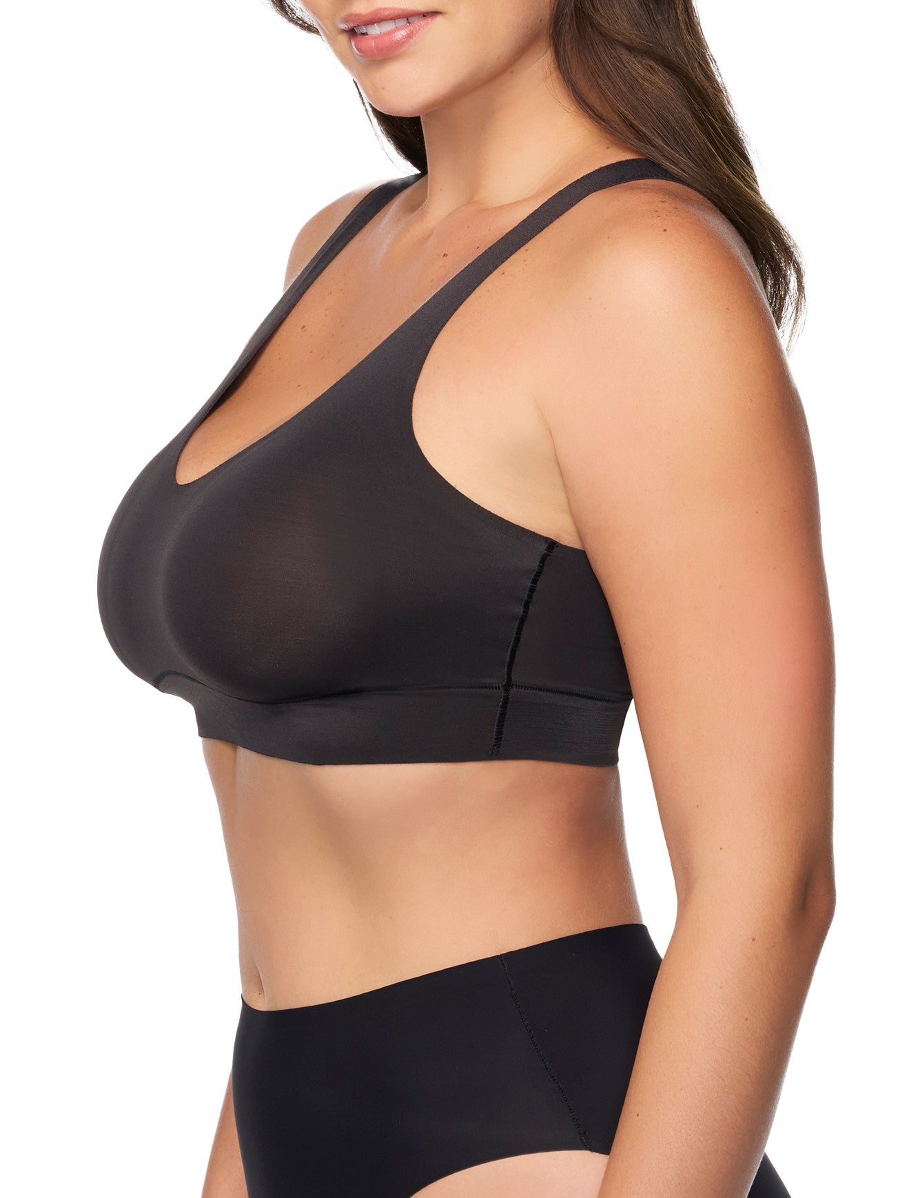 a woman wearing a black bralette wireless bra