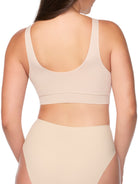 a woman wearing a nude bralette wireless bra
