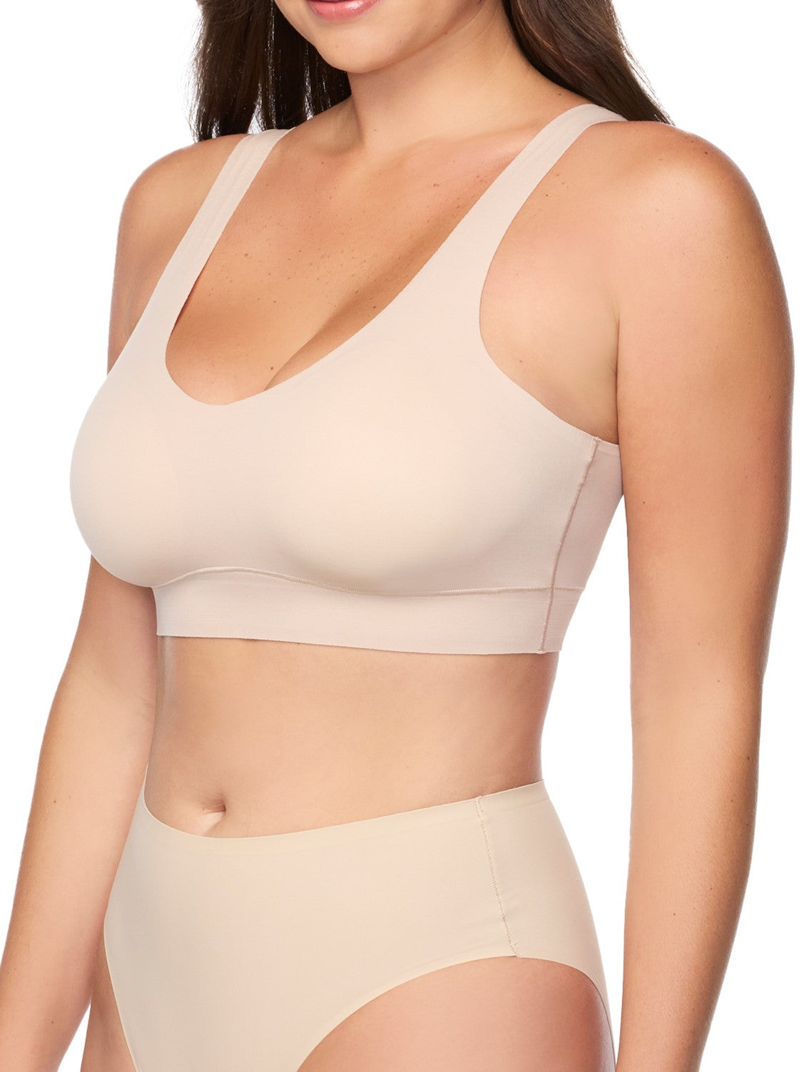 a woman wearing a nude bralette wireless bra