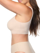 a woman wearing a nude bralette wireless bra