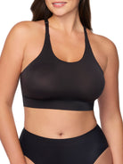 a woman wearing a black racerback wireless bralette