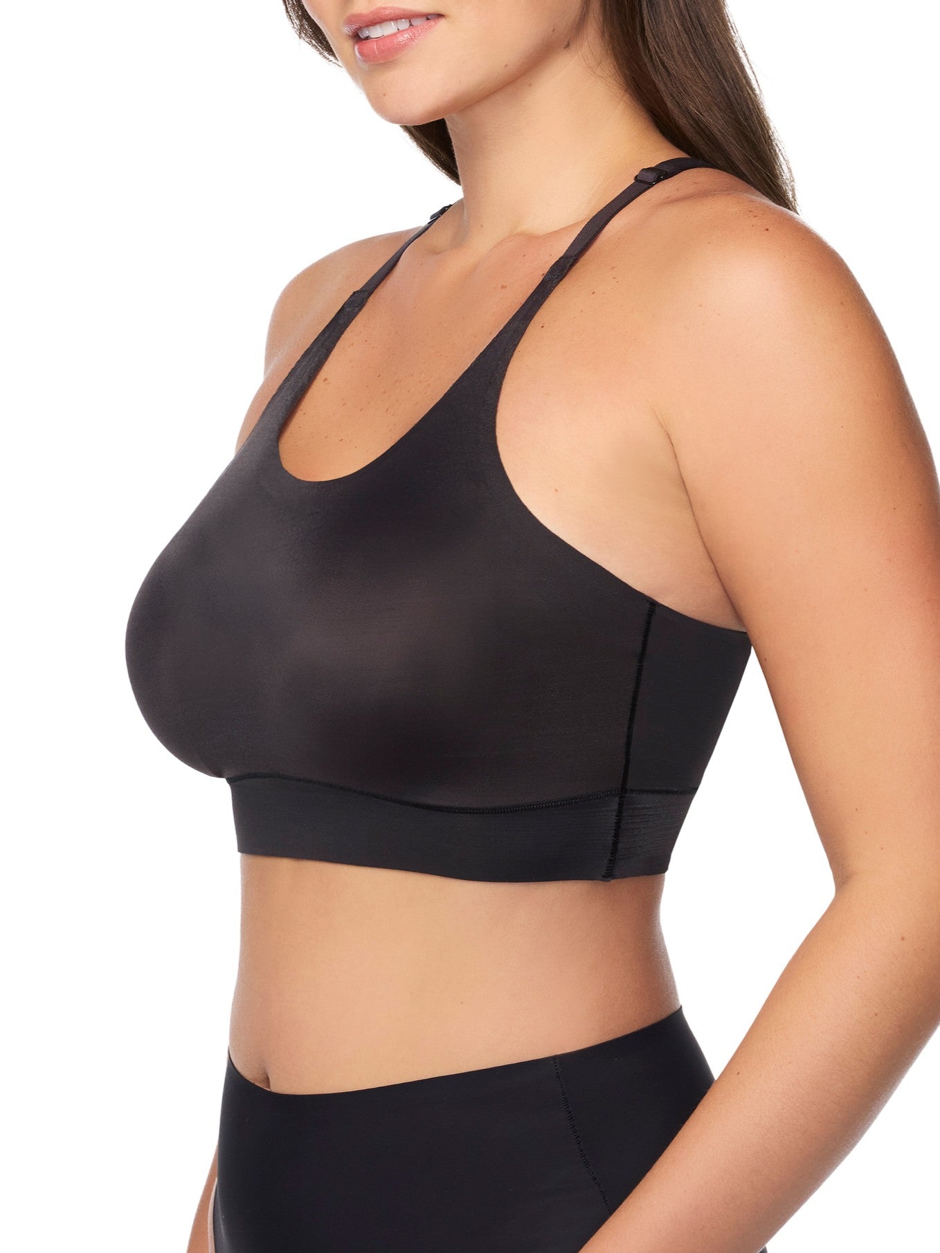 a woman wearing a black racerback wireless bralette