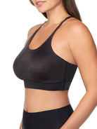 a woman wearing a black racerback wireless bralette