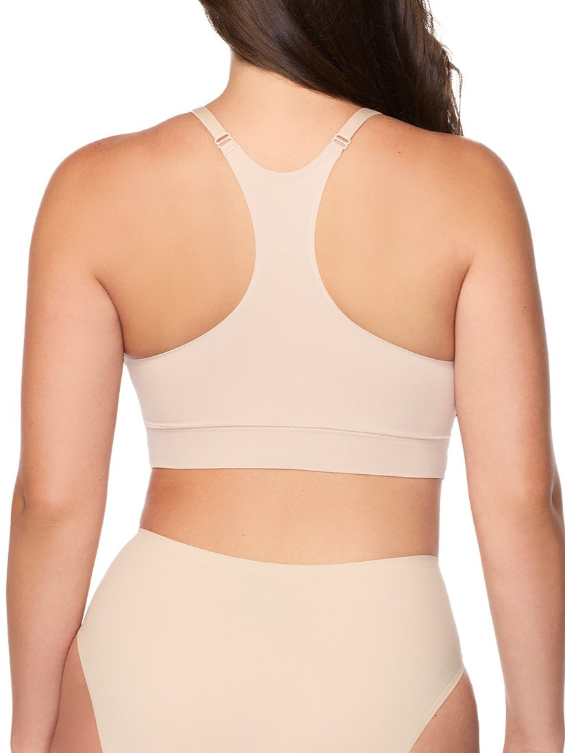a woman wearing a nude racerback wireless bralette