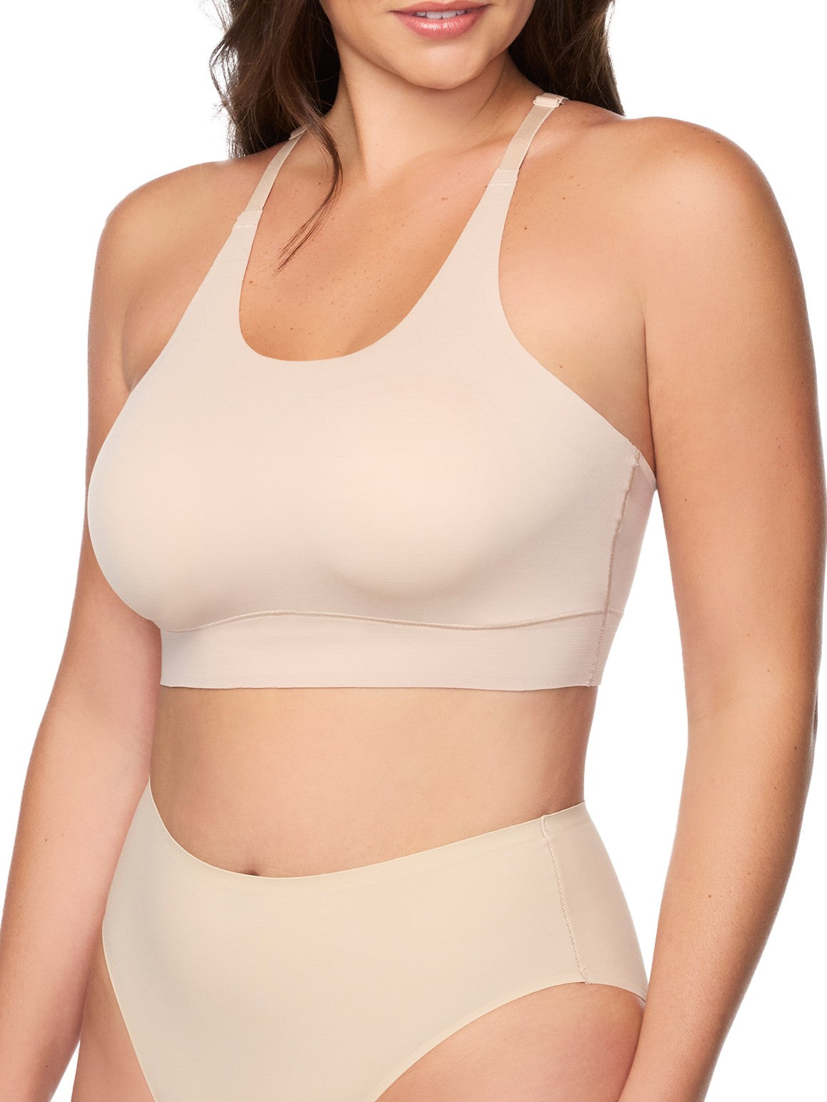 a woman wearing a nude racerback wireless bralette
