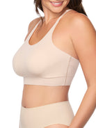 a woman wearing a nude racerback wireless bralette