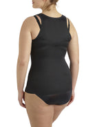 a woman wearing a black plus size open bust shaping camisole tank top