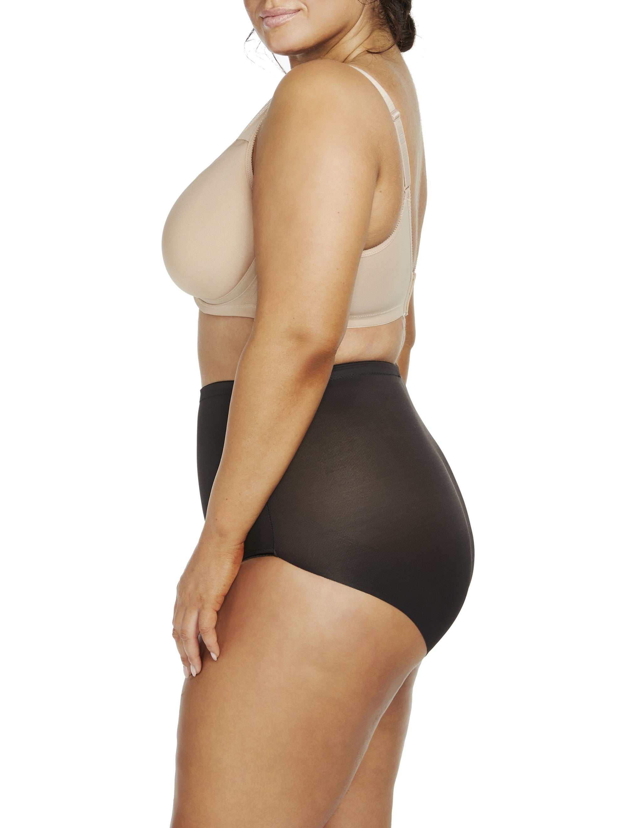 a woman wearing black plus size tummy control underwear shapewear