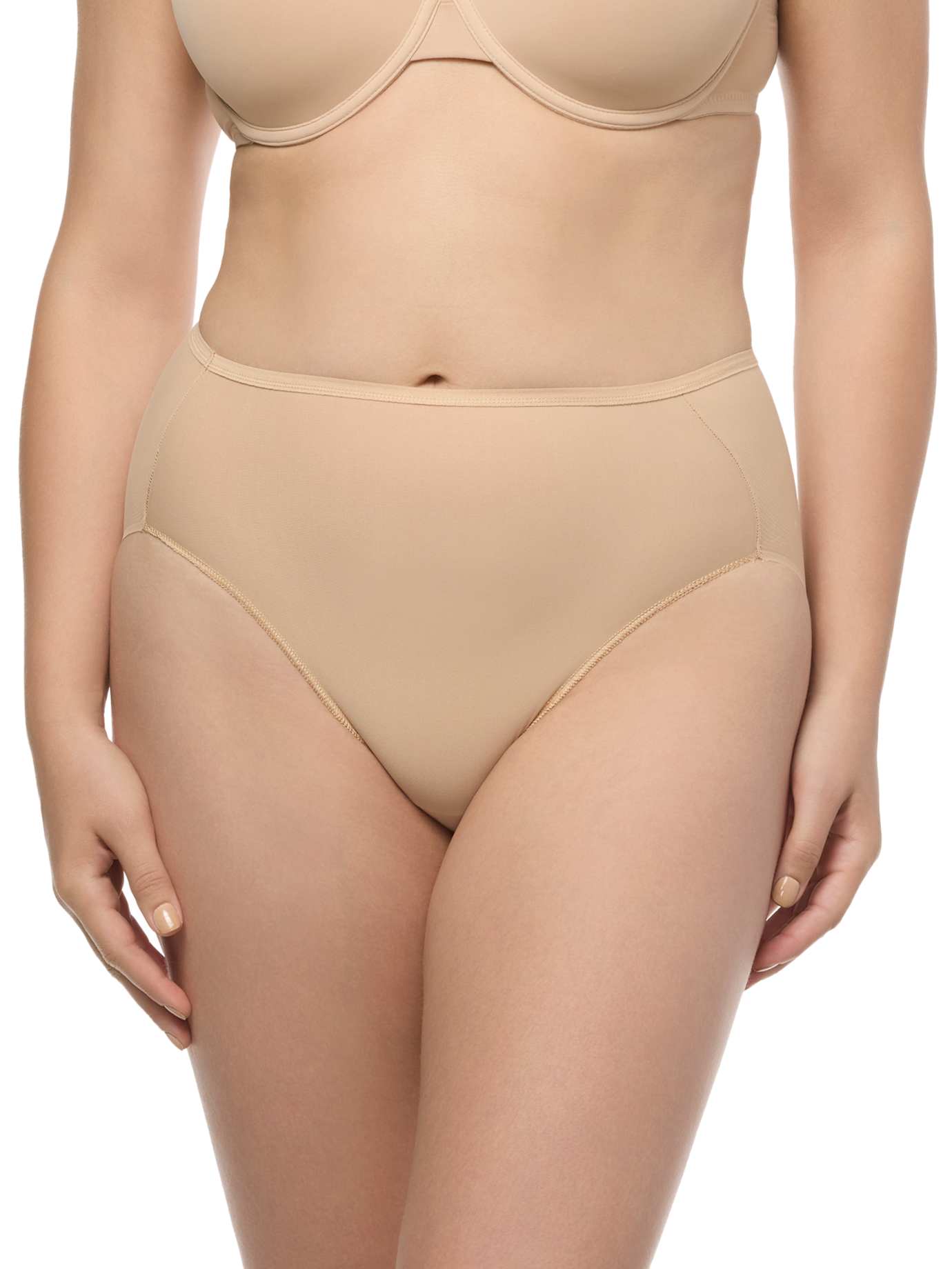 a woman wearing a beige high cut brief panty french cut