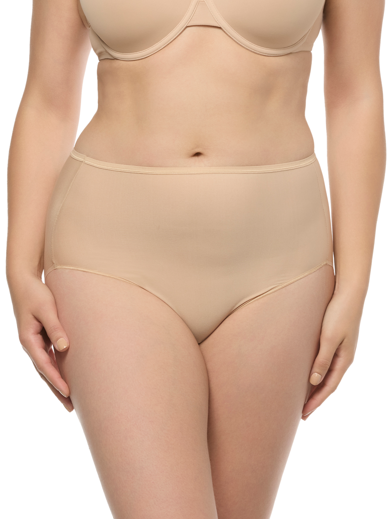a woman wearing a beige brief panty
