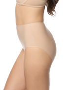 a woman wearing a beige brief panty women's underwear