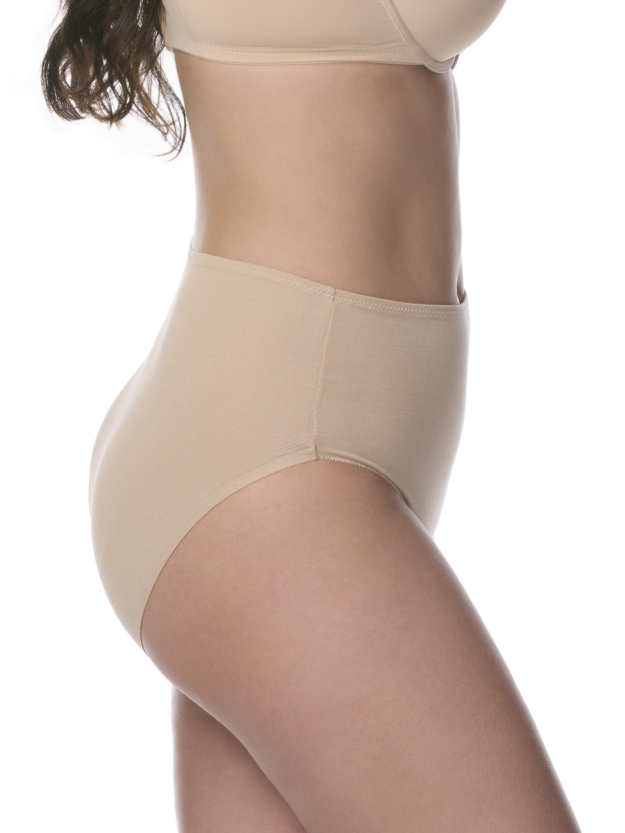 Beige underwear being worn by a person on a white background