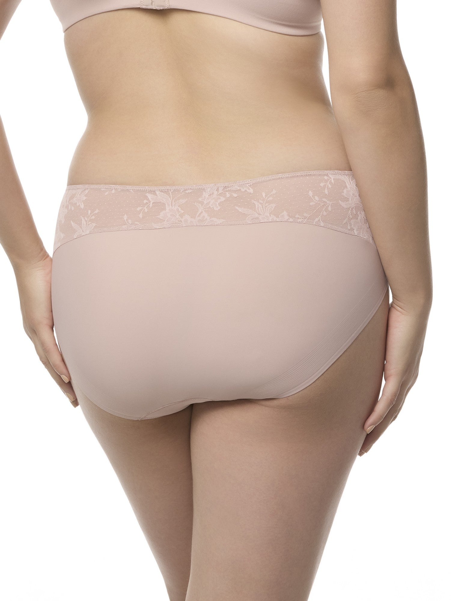 a woman wearing a light pink lace brief panty