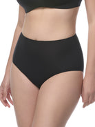 A model wearing a black brief showing against a plain white background. all-groups