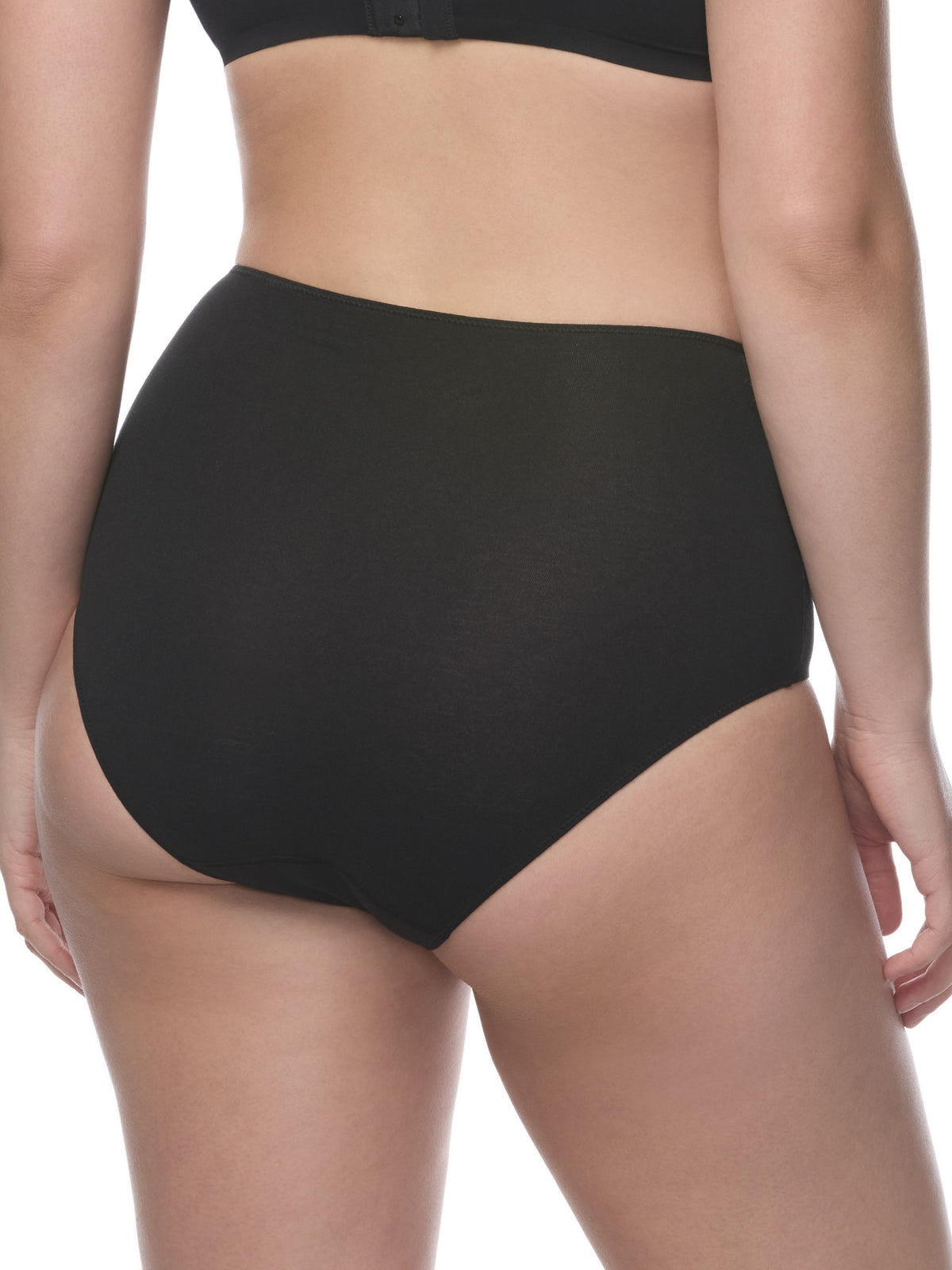 A model wearing a black brief showing against a plain white background. all-groups