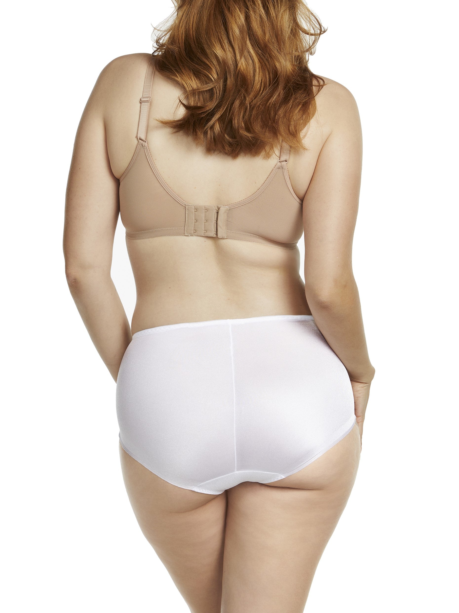 a woman wearing a white shaping brief