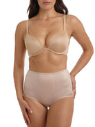 a woman wearing nude tummy control underwear shapewear