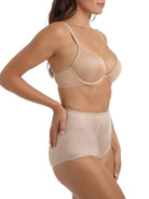 a woman wearing nude tummy control underwear shapewear