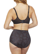 a woman wearing black tummy control underwear