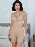 a woman wearing a nude open bust tummy control shaping bodysuit  shapewear all-groups