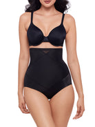 a woman wearing a black high waisted tummy control brief shapewear