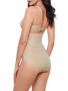 a woman wearing a beige high-waist shaping brief