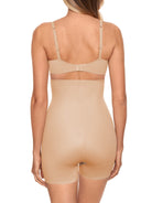 a woman wearing a nude high waisted tummy control shapewear short